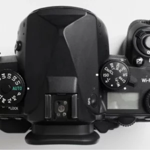 Hand holding photo camera